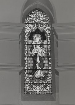 Interior. Chancel, detail of stained glass window to St. Margaret