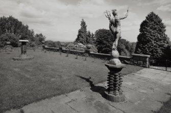 View of Terrace with basin and statue on brick plinths