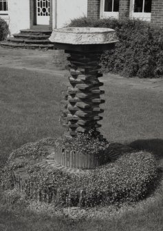 Detail of basin on brick plinth