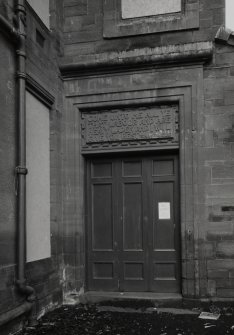 Detail of doorway to Villa Block 1 with inscription "COME UNTO ME ALL YE THAT LABOUR AND ARE HEAVY LADEN AND I WILL GIVE YOU REST"