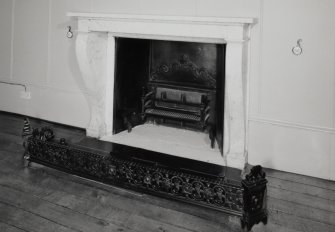 Entrance hall detail of fireplace