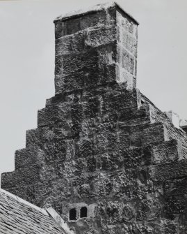 Detail of crowstepped E gable with pigeon ports.