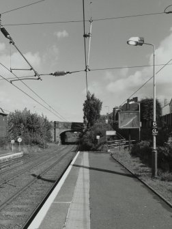 View of Thorn Brae road overbridge and E end of platforms from WSW.
