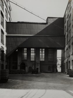 View from NNW of steam turbine house at SW corner of Mill No. 4 (also referred to as 'Inverted Engine House').  Undated.  Copied 1993.  Copyright and permission to reproduce, Mr D Ryan, Tootal Project Management, PO Box 3, Lees Street, Swinton, Manchester M27 2DA (part of Coates Viyella)