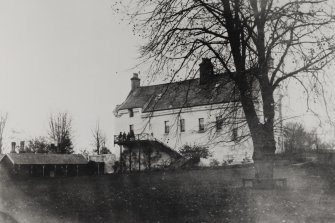 Copy of historic photograph showing view from NE before addition.