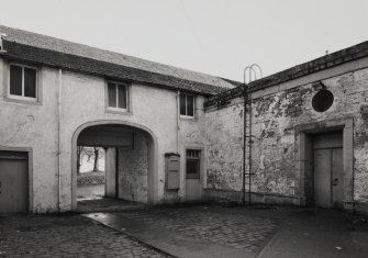 View of courtyard from W