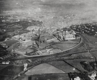 Oblique aerial view of the mills and works from SW.