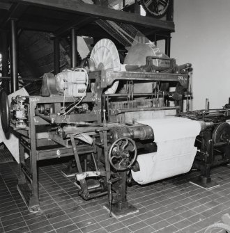 Carpet loom made by A F Craig Ltd of Paisley: front view after loom had been moved to the Royal Museum of Scotland from Stoddard's factory in Elderslie.  Photosurvey APR-1990