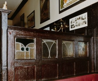 Interior.
Detail of decorative panel between seats.