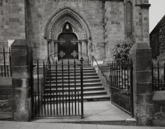 Main entrance, gate piers, wrought iron gate and stairs, detail