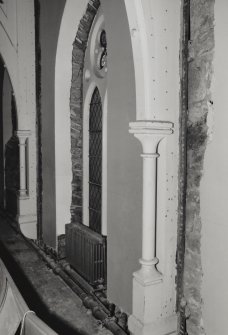 Pilaster and stained glass window, detail