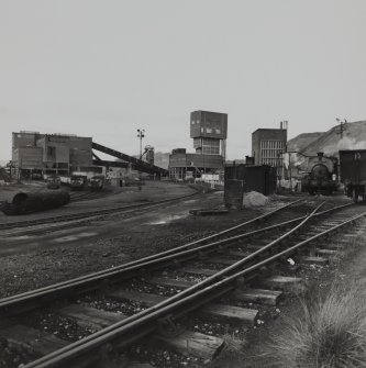 Bedlay Colliery. 
General view including coal preparation plant (left), pithead (centre), pithead baths (centre right), and colliery tank engine in steam (right).
