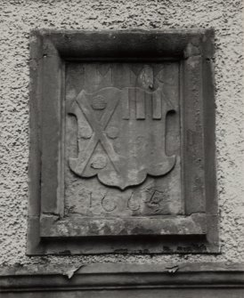 Detail of N doorway armorial panel.