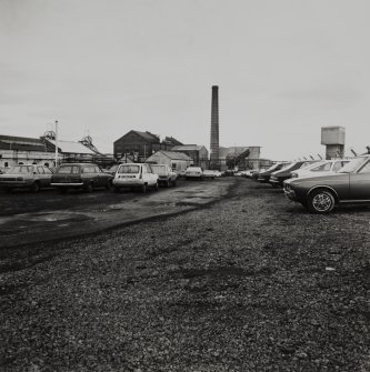 Cardowan Colliery.
General view of surface arrangement from car park, showing two shaft headframes (left), boiler house, chimney and compressor house (centre), and winding tower above third tower (right).
undated