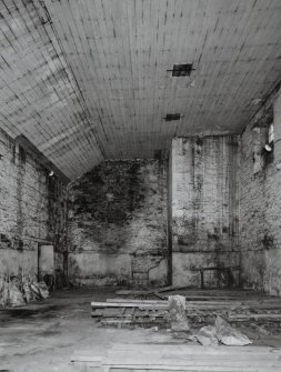 Interior.
View from W within former boiler house, showing base of boiler house chimney.