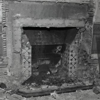 Interior.
Detail of Drawing room fireplace with only grate and tiles remaining