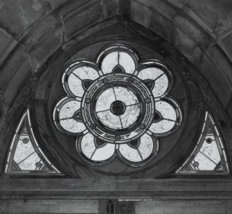 Interior.
Detail of remaining stained glass in hall.