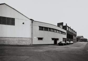 View from SSE of curved office block connecting Foundry with Pattern Shop
