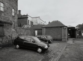 View of E side of station, with rear of main offices just visible from E.