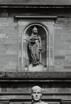 Detail of statue of Queen Victoria in niche above main entrance.