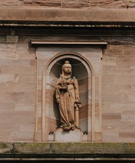 Detail of statue of Queen Victoria in niche above main entrance.