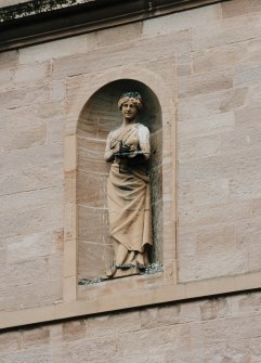 Detail of statue in niche on main facade.