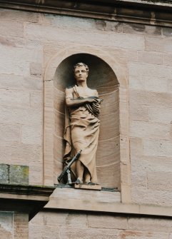 Detail of statue in niche on main facade.