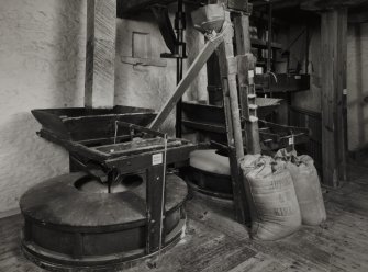 Interior.
View from E of millstones on first floor.