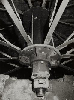 Interior.
Detail of water wheel bearing, shaft, hubs and arms.