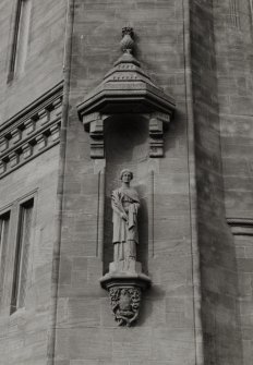 Detail of statue in niche on SE corner.