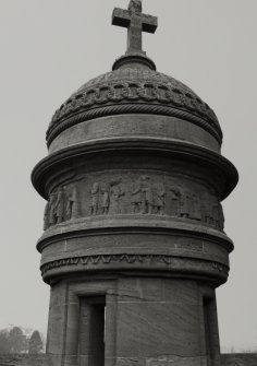 Detail of turret showing funeral procession.