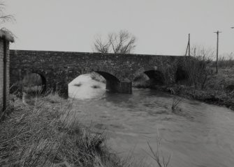 View from E of E side of bridge, showing all three arches