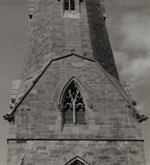 Detail of window in uppermost stage of tower.