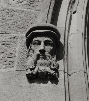 Detail of carved stone head.