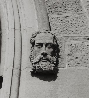 Detail of carved stone head.