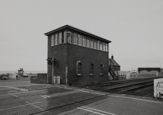 View from N showing signal box and part of the level crossing.