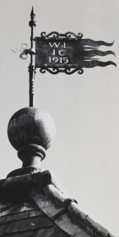 Detail of weather-vane and finial on N pavilion.