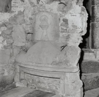Interior.
Detail of doorhead fragment in cap house.