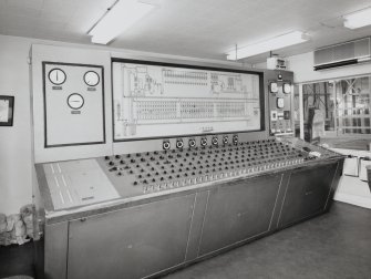 Console Room:  view from SE of main control panel, with barley lorry outside (backround) waiting to unload.  The Console Room is situated at the ground floor level of the adjacent Silo Block (to the SW), and the control panel was manufactured by 'Electric Construction'