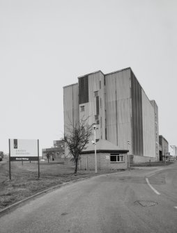 Exterior view from S of SW end of maltings silo block, adjacent to main maltings buildings