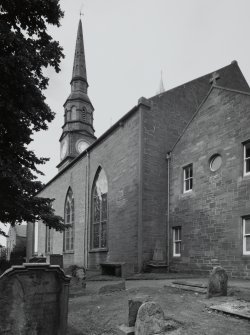 View from SE showing part of graveyard.