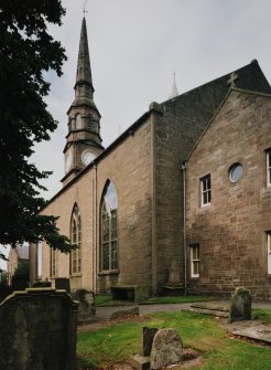 View from SE showing part of graveyard.