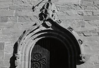 Detail of hoodmould above S entrance.