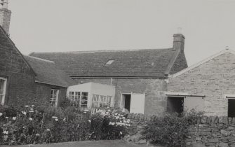 View of old farmhouse.