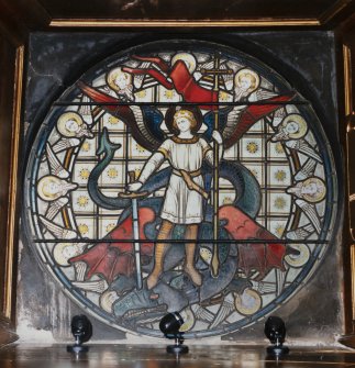Interior.
Detail showing circular stained glass window depicting St George slaying the dragon in W wall of chapel.