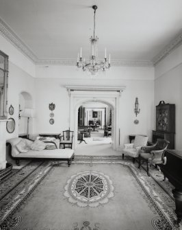 Interior.  Ground floor, living room, view from bowed end showing enfilade of S flank apartments.