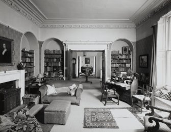 Interior.  Ground floor, view of library showing enfilade of S flank apartments.