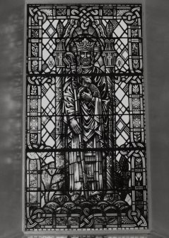 Interior.
Detail of stained glass by A L Russel in memory of Rev J Kirkland Cameron depicting Christ the good shepherd.