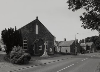 View from North East showing hall and war memorial cross