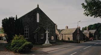 View from North East showing hall and war memorial cross
